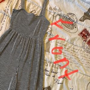 Cloth material. Capri jumper black and white stripe.